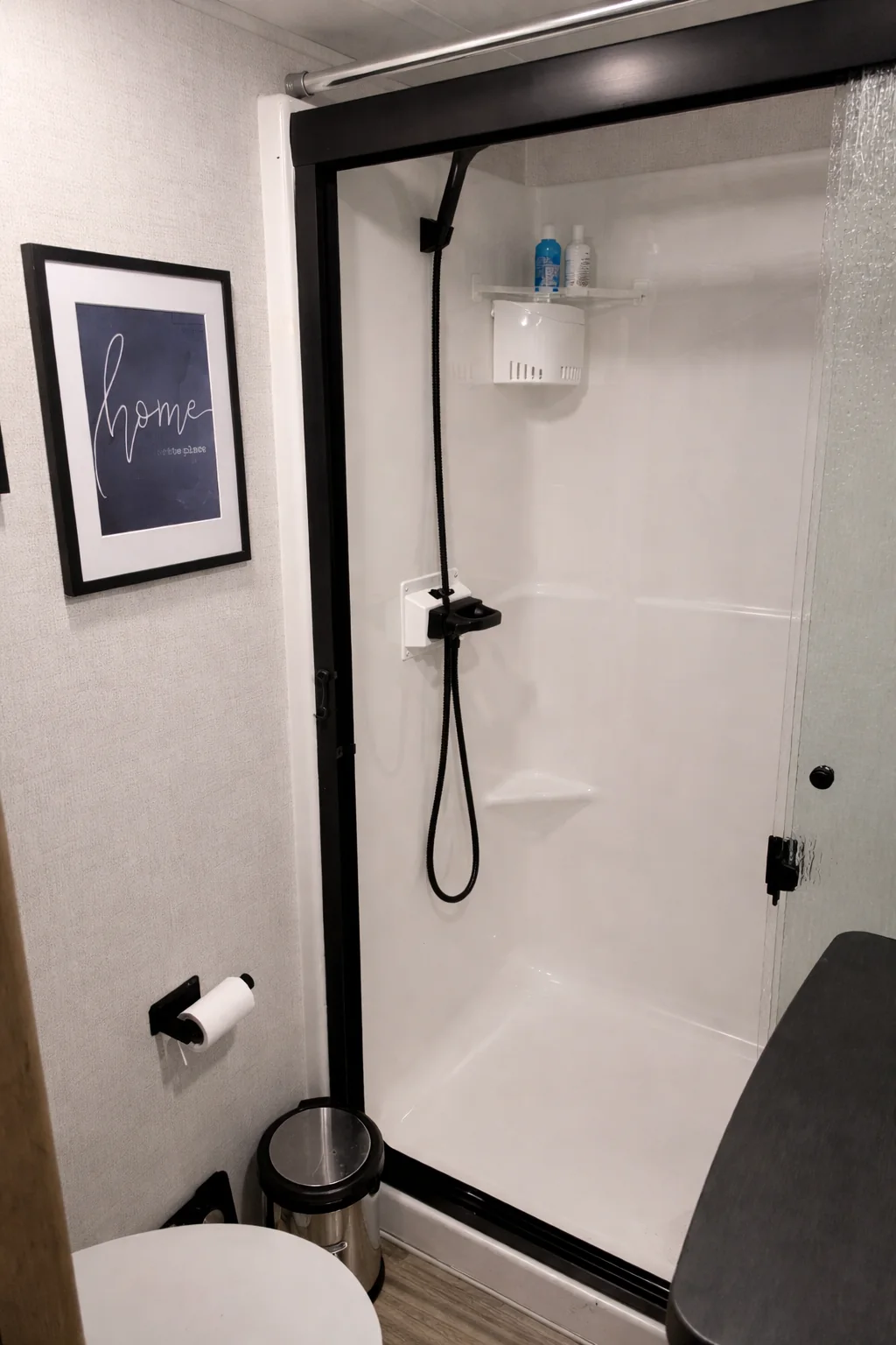 Private full bathroom with a clean enclosed shower